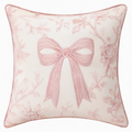 Cojín decorativo cuadrado 45 cm de tejido beige y rosa con lazo floral
